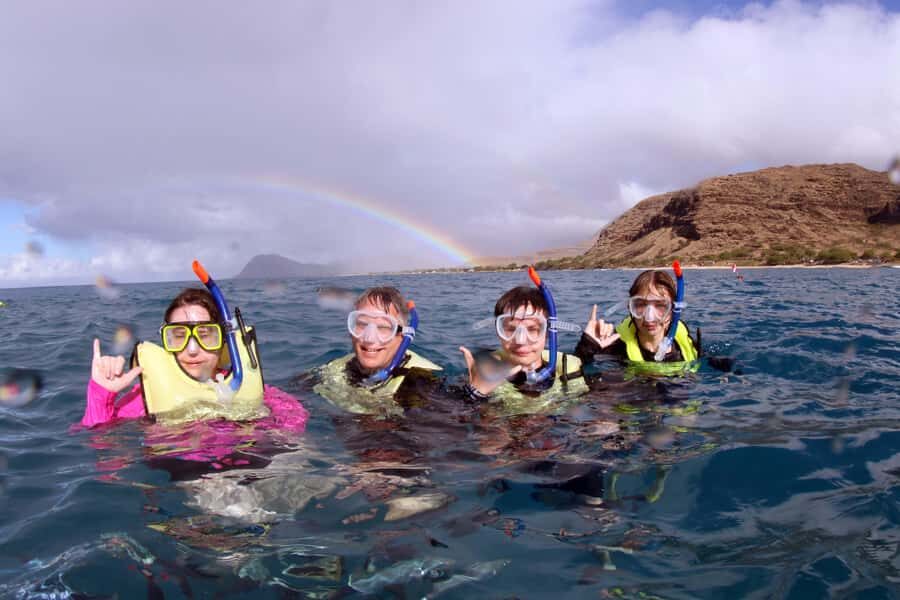 Oahu: Snorkeling & Dolphin Watch Cruise w/ Luau Style Buffet - Boarding on a 62-foot catamaran: comfort matters