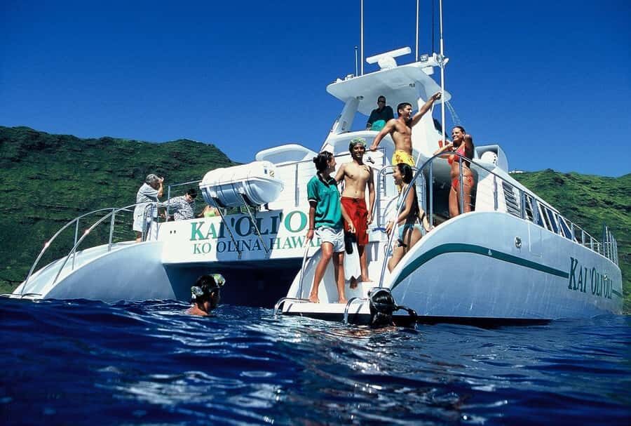 Oahu: Snorkeling & Dolphin Watch Cruise with Hawaiian Buffet - Inside the 62’ catamaran: shade, bathrooms, and less cranky travel energy